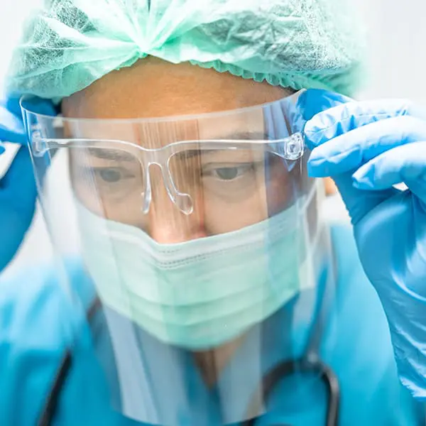 Ensure worker & medical safety with high-strength, chemical-resistant, & impact-resistant PVC & polymer materials for PPE applications, including gloves, gowns, & shields