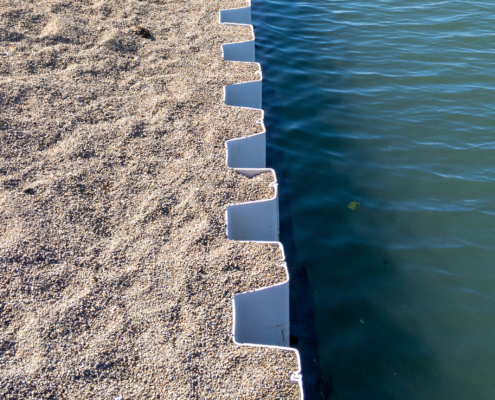 Aurora Material Solutions - Vinyl seawalls provide durable, corrosion-resistant solutions for coastal protection. Unlike traditional wood, concrete, or steel seawalls, plastic seawalls offer long-term resistance to UV exposure, saltwater, and environmental wear.