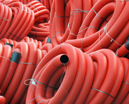 Aurora Material Solutions - Our thermoplastic & polymer formulations for industrial hoses & tubing used in high-pressure, hydraulic & chemical transfer applications require high-tensile strength & durability.